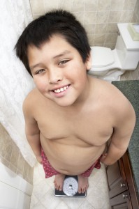 boy with childhood obesity